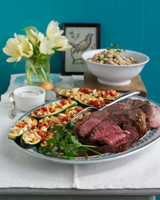 Roasted Lamb with Garlic, White Bean Salad, and Stuffed Zucchini 