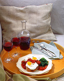 Poached Eggs with Tomato Sauce over Parmesan Toasts and Sauteed Spinach 
