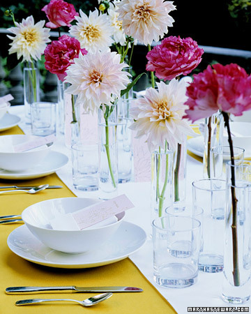 Delicate and airy this centerpiece composed of single blossoms lets you 